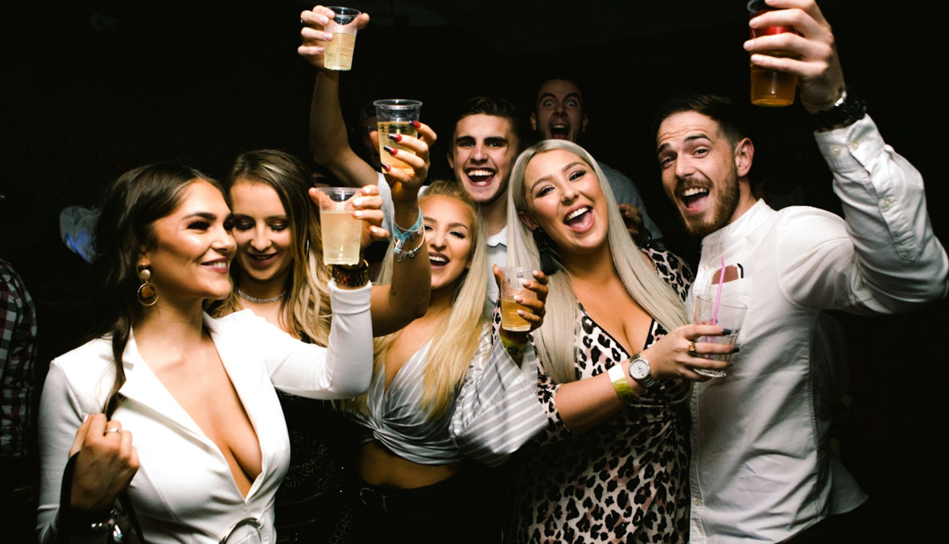 People playing drinking games
